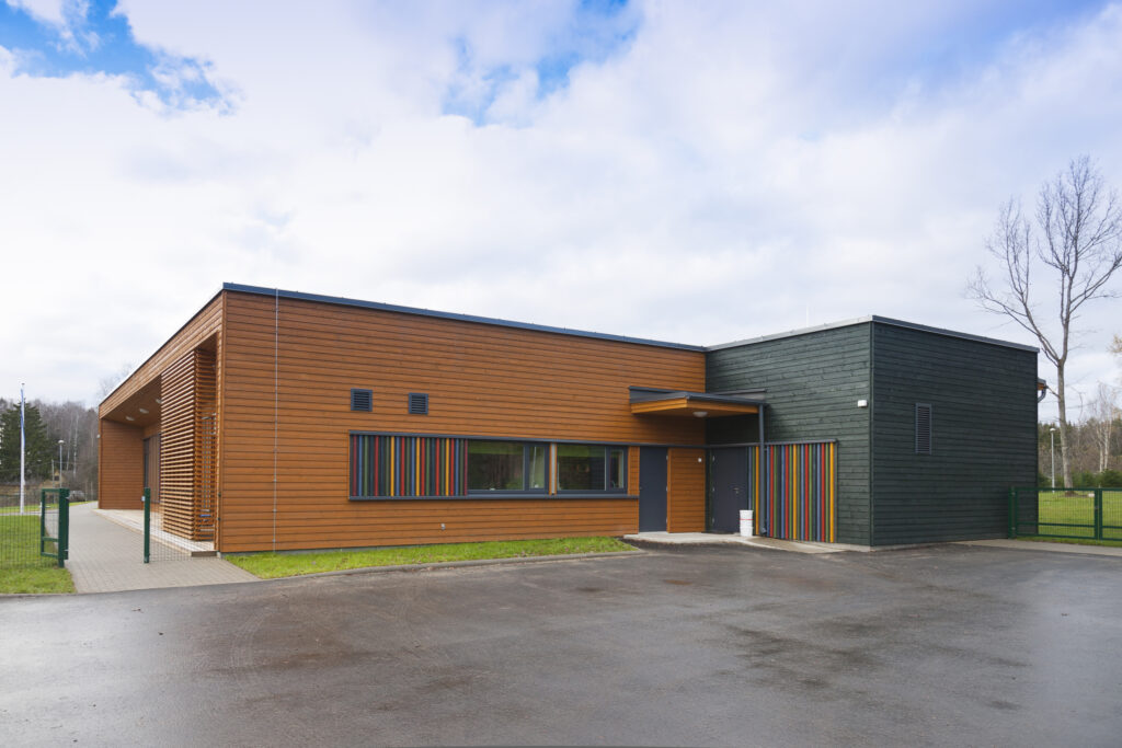 kindergarten building,estonia,a modern building, a pre school entrance and playground