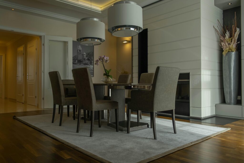 Stylish dining area with soft lighting, contemporary furniture, and a cozy feel.
